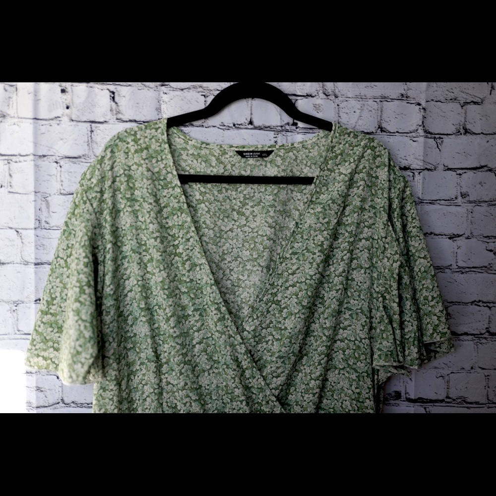 Wrap dress with white and green flower pattern